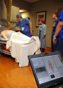 SAN DIEGO (Oct. 13, 2010) A laptop is used to control a training mannequin's vital signs during a mock code blue drill at the pain management clinic at Naval Medical Center San Diego. Mannequins offer health care providers the opportunity to practice using simulated patients and sophisticated technology. (U.S. Navy Photo by Mass Communication Specialist 1st Class Anastasia Puscian/Released)